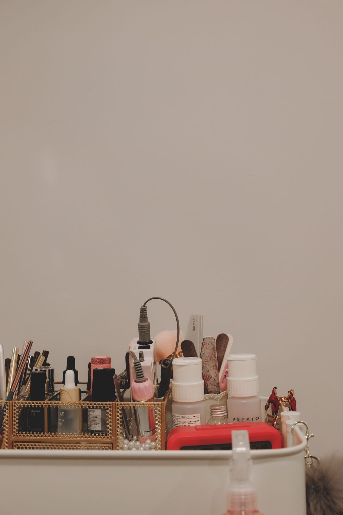 A small assortment of cosmetic products and accessories